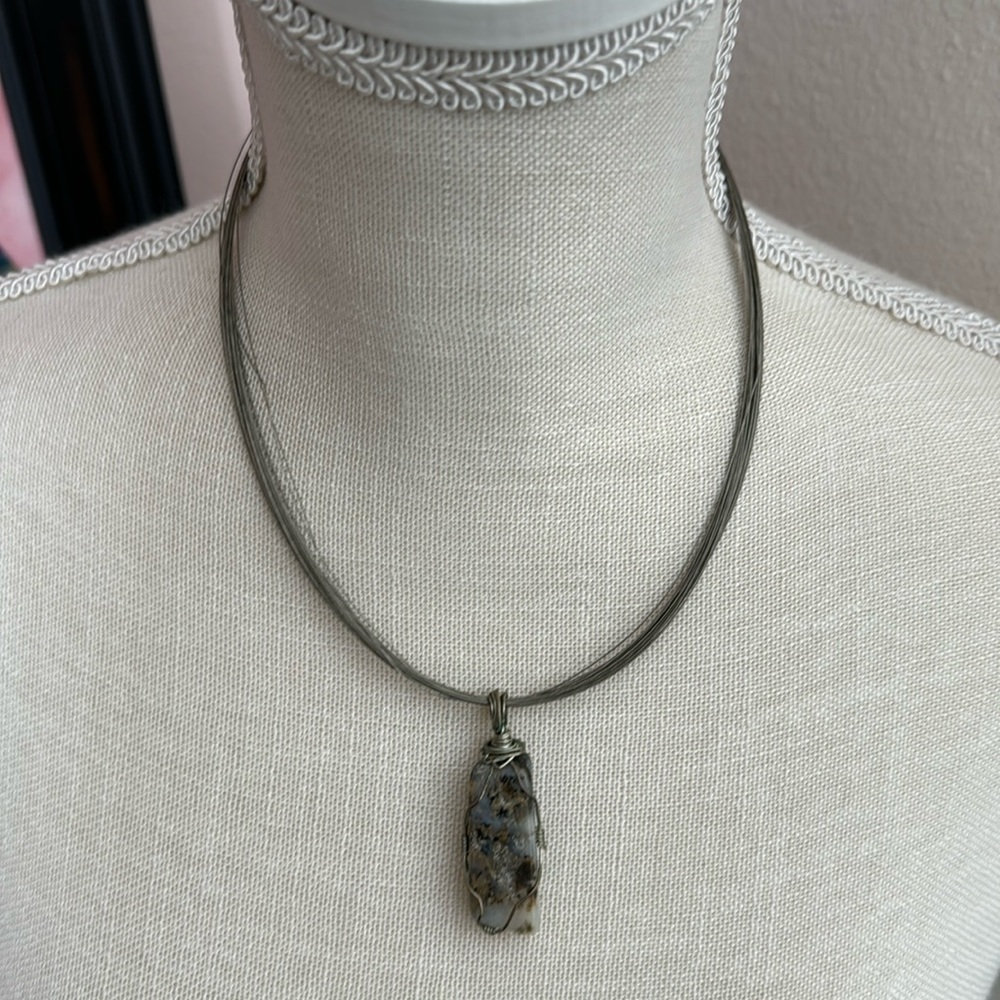 Multi strand, silver tone, natural stone wire wrapped necklace.